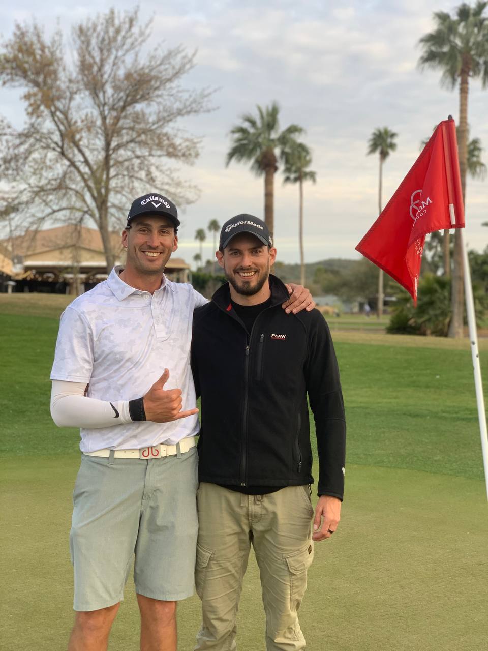 Tim Collet with pro golfer Ollie Roberts