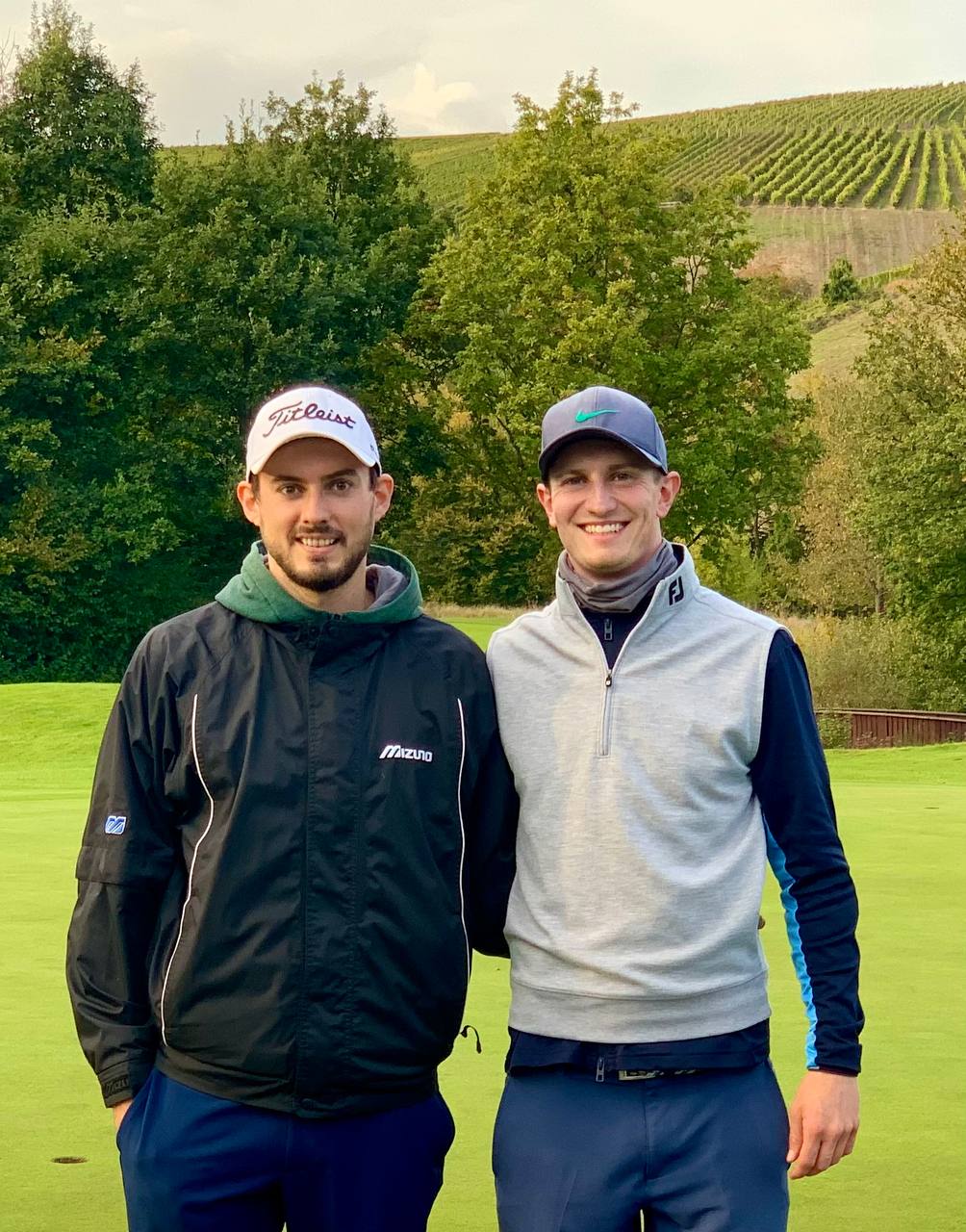 Tim Collet with pro golfer Simon Junk